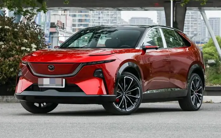 Red Mazda EZ-60 parked on a city street